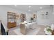 Stylish home office with modern desk, built-in bookshelves, and great natural light at 8233 Houser St, Cornelius, NC 28031