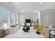 Modern living room with plush seating, stylish decor, and abundant natural light at 8233 Houser St, Cornelius, NC 28031