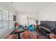Comfortable living room with colorful accents, chess set, and piano at 8638 Raven Top Dr, Mint Hill, NC 28227