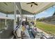 Enjoy outdoor living on this covered patio with comfortable seating and stylish decor at 8638 Raven Top Dr, Mint Hill, NC 28227