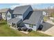 Beautiful backyard view showcasing the patio and lush green space at 8638 Raven Top Dr, Mint Hill, NC 28227