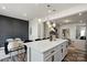 Spacious kitchen with large island, perfect for entertaining, adjacent to the living room and dining areas at 9042 Northfield Crossing Dr, Charlotte, NC 28269