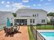 Large wooden deck featuring a dining set and screened-in porch offers an excellent space for outdoor gatherings at 924 Stebbins Dr, Fort Mill, SC 29715