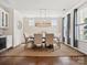 A stylish dining room with a modern light fixture, setting an inviting atmosphere for meals at 924 Stebbins Dr, Fort Mill, SC 29715