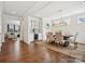 Bright dining room with a modern light fixture, elegant decor, and seamless access to the living area at 924 Stebbins Dr, Fort Mill, SC 29715