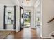 Elegant foyer with hardwood floors, an open doorway, and a view of the exterior at 924 Stebbins Dr, Fort Mill, SC 29715