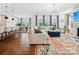 Spacious living room featuring an open floor plan, hardwood floors, and modern decor at 924 Stebbins Dr, Fort Mill, SC 29715