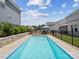 Backyard featuring a rectangular pool and nice patio area, perfect for summer fun and entertaining guests at 924 Stebbins Dr, Fort Mill, SC 29715