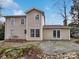 Expansive backyard with a stone patio and lush landscaping, perfect for outdoor living at 10301 Shelter Rock Ct, Charlotte, NC 28214