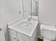 Bathroom featuring a single vanity, mirror, and a toilet at 10301 Shelter Rock Ct, Charlotte, NC 28214