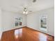 Bright, sunlit bedroom with hardwood floors and windows offering pleasant views of the outdoors at 104 Tarrington Dr, Statesville, NC 28625