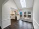 Charming dining area with skylight and access to deck offers bright gathering space at 106 Cape Breton Trl, Gastonia, NC 28056