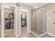 Bathroom featuring a walk-in glass shower and access to two walk-in closets at 10615 Persimmon Creek Dr, Mint Hill, NC 28227