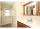 Bathroom vanity featuring wood cabinets, chrome faucet, and medicine cabinet at 107 Stanford Dr, Stanley, NC 28164