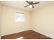 Standard bedroom with hardwood floors, ceiling fan, window and natural light at 107 Stanford Dr, Stanley, NC 28164