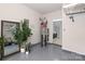 Utility room with water heater and a glimpse into laundry room for added convenience at 10911 Round Rock Rd, Charlotte, NC 28277