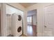 Convenient laundry area with washer, dryer, and shelving at 110 Balsam Dr, Lincolnton, NC 28092