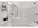 Clean and bright bathroom with white vanity, shower-tub combo, and stylish fixtures at 1141 6Th St, Lancaster, SC 29720