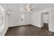 Bright living room featuring sleek flooring, a ceiling fan, and ample natural light at 1141 6Th St, Lancaster, SC 29720