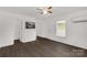 Inviting living room featuring sleek flooring and multiple doorways and windows at 1141 6Th St, Lancaster, SC 29720
