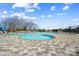 Stunning community pool with inviting seating and lush surroundings, perfect for relaxation and social gatherings at 13101 Cozy Ct, Charlotte, NC 28215