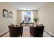 Bright home office featuring natural light, simple decor, and cozy seating at 13101 Cozy Ct, Charlotte, NC 28215