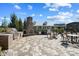 Well-equipped outdoor kitchen and dining area with built-in grill, ideal for al fresco entertaining and gatherings at 13101 Cozy Ct, Charlotte, NC 28215