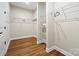 A well-organized walk-in closet with wire shelving, providing ample storage space at 13101 Cozy Ct, Charlotte, NC 28215