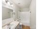 Clean bathroom featuring a vanity with sink and a shower-tub combination at 1311 Shady Oak Trl, Gastonia, NC 28052