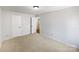 Comfortable bedroom with carpeted floors and two closets that provides ample storage space at 1311 Shady Oak Trl, Gastonia, NC 28052