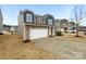 Attractive two-story home with a two-car garage and landscaped front yard at 133 Sequoia St, Mooresville, NC 28117