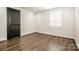 Clean, modern bedroom featuring light walls, crown molding and hardwood floors at 1331 14Th Ne St, Hickory, NC 28601