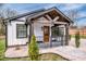 Attractive white exterior with black trim, covered porch, and tastefully landscaped front yard at 1331 14Th Ne St, Hickory, NC 28601