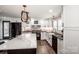 Gourmet kitchen featuring a center island with white marble countertops and an eat-in breakfast bar at 1331 14Th Ne St, Hickory, NC 28601