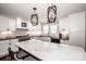 Modern kitchen features white cabinets, a center island with seating, and state-of-the-art appliances at 1331 14Th Ne St, Hickory, NC 28601