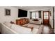 Comfortable living room with hardwood floors, stylish furniture, and a large mounted television at 1331 14Th Ne St, Hickory, NC 28601