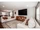 Cozy living room featuring a large TV, comfortable sofas, and an inviting area rug at 1331 14Th Ne St, Hickory, NC 28601