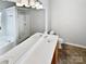 Bright bathroom with a double sink vanity and a shower-tub combination at 1419 Deer Forest Dr, Fort Mill, SC 29707