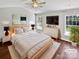 Bright bedroom with hardwood floors, large windows and a ceiling fan at 1419 Deer Forest Dr, Fort Mill, SC 29707