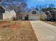 Charming single-Gathering home with a well-maintained lawn and long driveway at 1419 Deer Forest Dr, Fort Mill, SC 29707