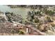 An aerial view emphasizing the property's unique location near a tranquil lake at 144 Cherokee Ln, New London, NC 28127