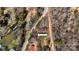 Aerial view highlighting this property's location surrounded by lush trees at 144 Cherokee Ln, New London, NC 28127