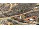 Overhead view showcases this property nestled among the bare trees at 144 Cherokee Ln, New London, NC 28127
