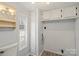 This bathroom is a half bath with white cabinets, and features a white toilet, providing essential facilities at 144 Cherokee Ln, New London, NC 28127