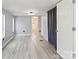This bedroom has gray walls, wood flooring and is a well-lit and neutral space for comfortable living at 144 Cherokee Ln, New London, NC 28127