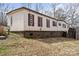 Charming single-story home with brown shutters, well-maintained siding, and a cozy, inviting atmosphere at 144 Cherokee Ln, New London, NC 28127