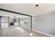 Bright living room with ample natural light and modern floors flowing into the kitchen at 144 Cherokee Ln, New London, NC 28127