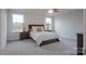 This spacious bedroom boasts plush carpeting, soft, natural light, and neutral tones for a peaceful ambiance at 149 High Rock Ct # 02, Statesville, NC 28677