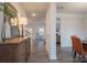 Inviting foyer showcasing wood floors, ample lighting, and seamless transition to other rooms at 149 High Rock Ct # 02, Statesville, NC 28677