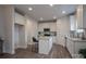 Modern kitchen featuring granite countertops, stainless steel appliances, and island seating at 149 High Rock Ct # 02, Statesville, NC 28677